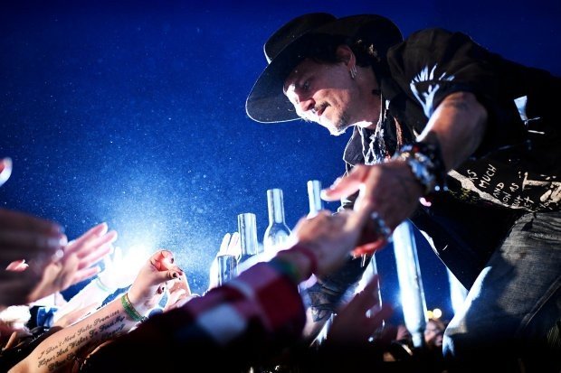 Actor Johnny Depp arrives at Worthy Farm in Somerset during the Glastonbury Festival